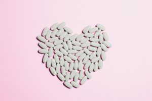 Blue Medicine Pills on Heart Shape